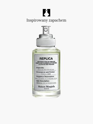 Przezroczysty flakon perfum z etykietą "769" ze srebrnym rozpylaczem i białą etykietą znajduje się na białym tle. Nad butelką widnieje polski tekst "Inspirowany zapachem".